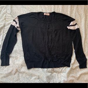 Black cropped sweater with white stripes